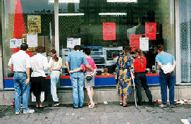 Easterners window shopping in West Berlin