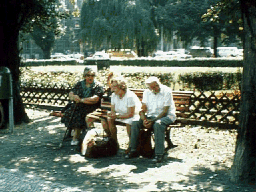 Old folks sitting on a bench