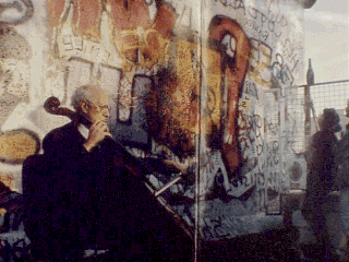 The famed cellist plays at the Berlin Wall